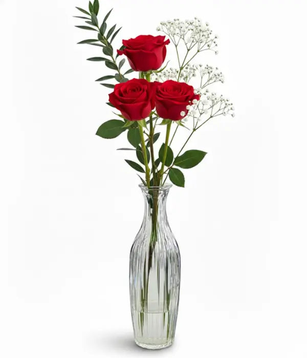 Red roses in bud vase from florist