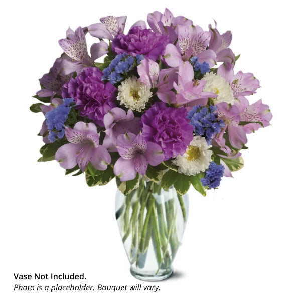 Florist's choice of hand-held arrangement for Mother's Day